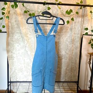 Light wash blue Jean overall dress.